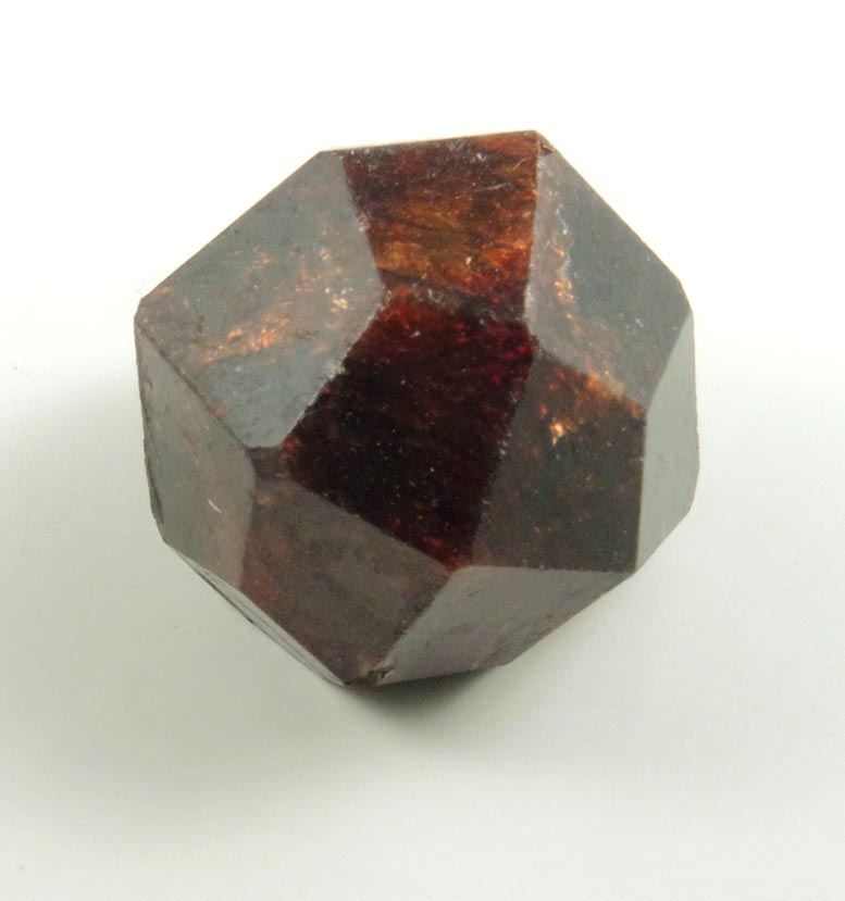 Detail view of mineral Almandine Garnet for sale from 65th Street at Columbus Avenue, Manhattan Island, New York City, New York County, New York